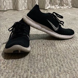 Black and white nike shoes